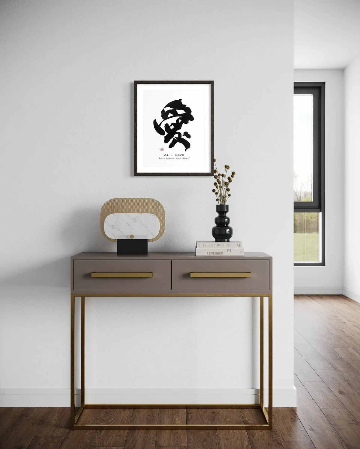 Framed Japanese calligraphy wall art above minimalist console table in modern interior