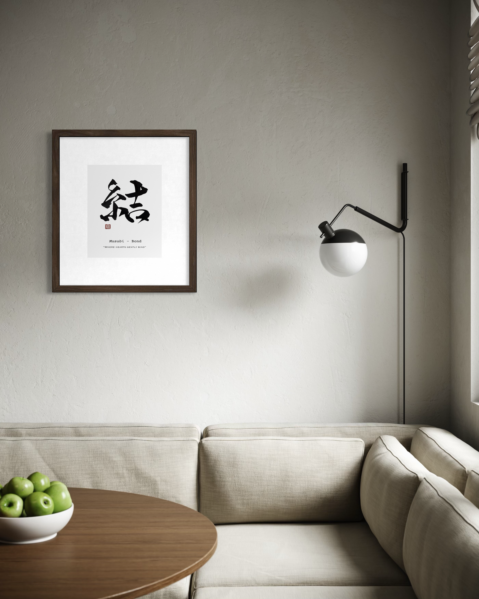 Modern living room with a framed artwork on the wall, a lamp, and a sofa.